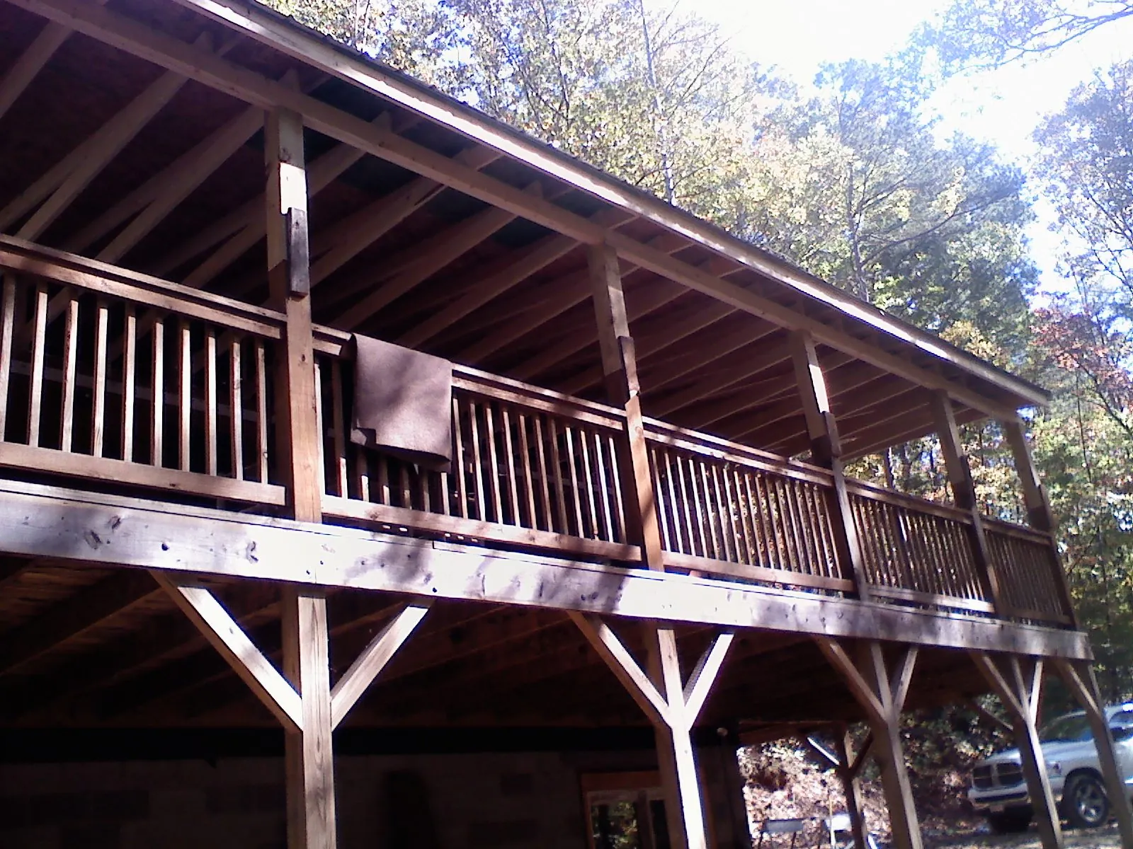 Timber framing under a new elevated porch and deck — Roof Leak Repair in Powhatan Point by Roofing Brothers